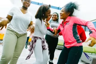 Youth moving around each other