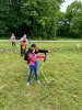Kids learning archery